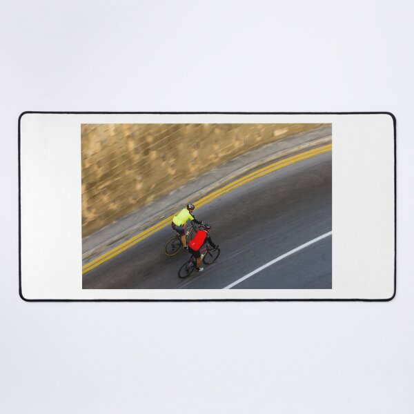 Item preview, Two Road Cyclists Riding Together Along Curved Urban Street in Motion designed and sold by Nmallia.