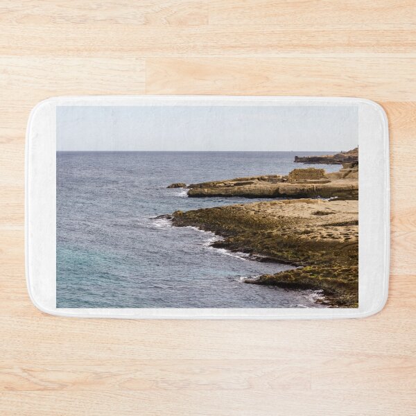 Item preview, Rocky Coastline and Calm Sea with Sandy Cliffs Under a Clear Sky designed and sold by Nmallia.