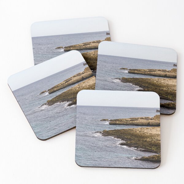 Item preview, Rocky Coastline and Calm Sea with Sandy Cliffs Under a Clear Sky designed and sold by Nmallia.