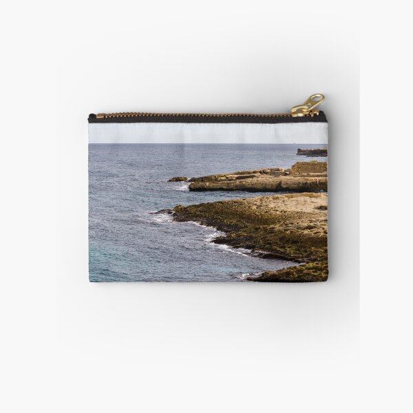 Item preview, Rocky Coastline and Calm Sea with Sandy Cliffs Under a Clear Sky designed and sold by Nmallia.