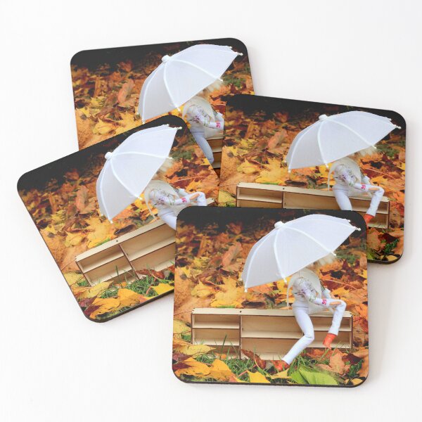 Item preview, Doll with umbrella siting on bookcase with the background of yellow orange autumn leaves designed and sold by Lenasminiland.