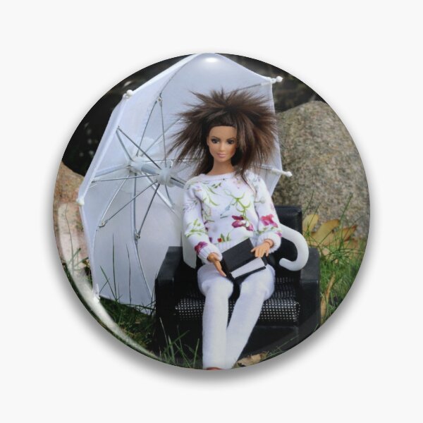 Item preview, Doll with umbrella siting on the char with the background of lake, stones and autumn leaves designed and sold by Lenasminiland.