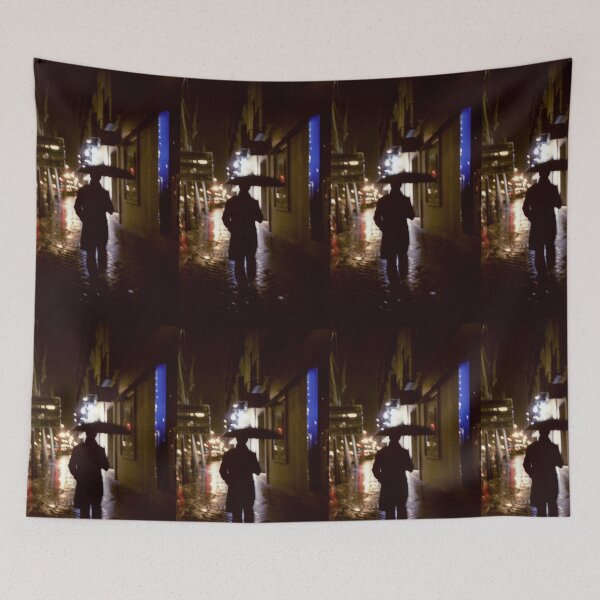 Item preview, Man walking in street at night in rain color 35mm analogue photojournalism portrait photograph designed and sold by edwardolive.