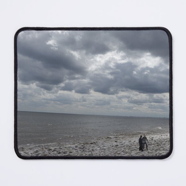 Item preview, pebbled beach  with threatening clouds designed and sold by Stephen Green Creative Photography.