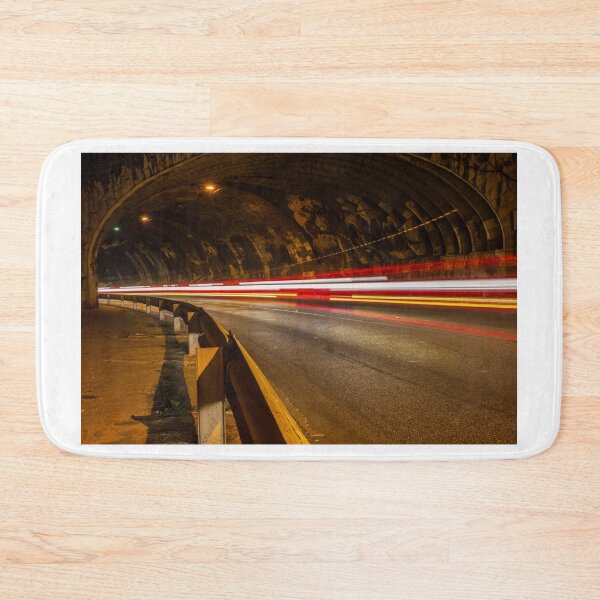 Item preview, Long Exposure Light Trails in Urban Road Tunnel at Night With Passing Traffic and Guardrail designed and sold by Nmallia.