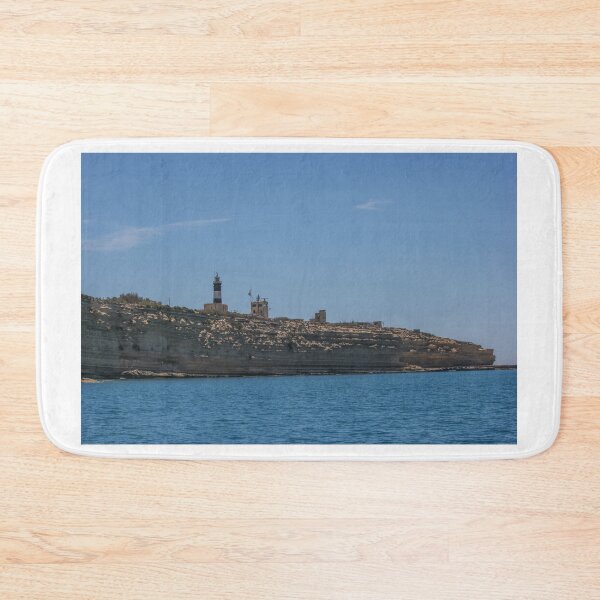 Item preview, Lighthouse on Rocky Coastal Cliffs Over Calm Blue Sea Under Clear Summer Sky for Navigation designed and sold by Nmallia.