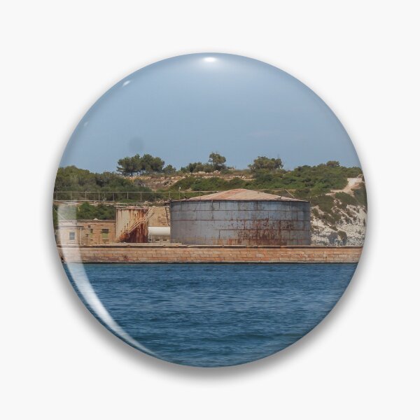 Item preview, Rusted Industrial Storage Tank on Coastal Pier With Cliffs and Blue Sea Horizon designed and sold by Nmallia.