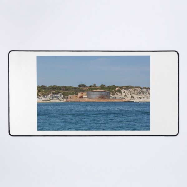 Item preview, Rusted Industrial Storage Tank on Coastal Pier With Cliffs and Blue Sea Horizon designed and sold by Nmallia.