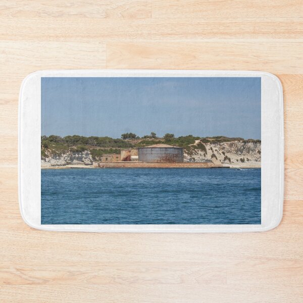 Item preview, Rusted Industrial Storage Tank on Coastal Pier With Cliffs and Blue Sea Horizon designed and sold by Nmallia.