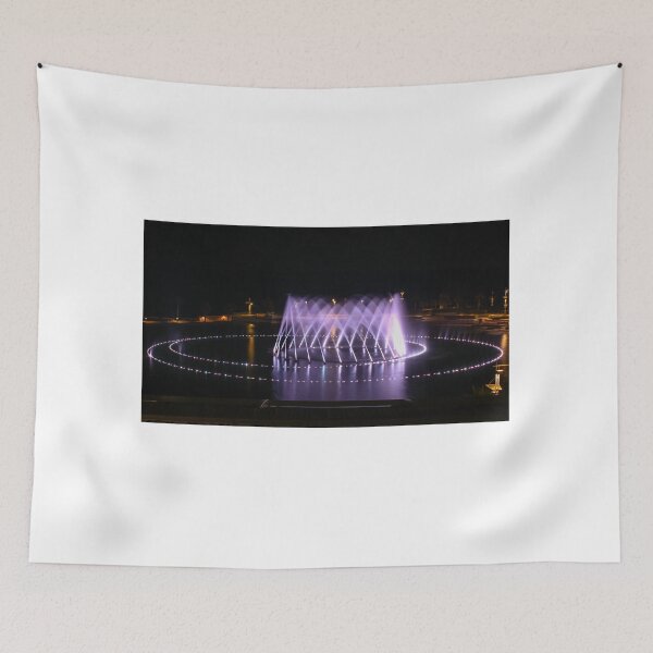Item preview, Illuminated Circular Fountain Light Show Over Lake at Night With Water Jets and Reflections designed and sold by Nmallia.