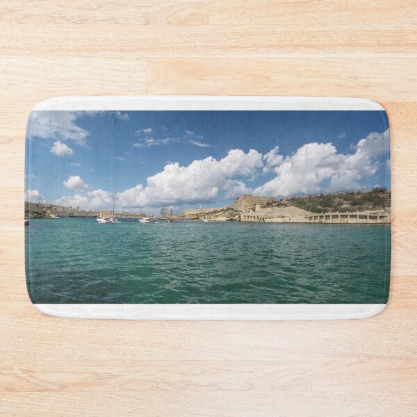 Item preview, Turquoise Harbor With Boats And Historic Stone Fort Under A Dramatic Cloudy Sky designed and sold by Nmallia.