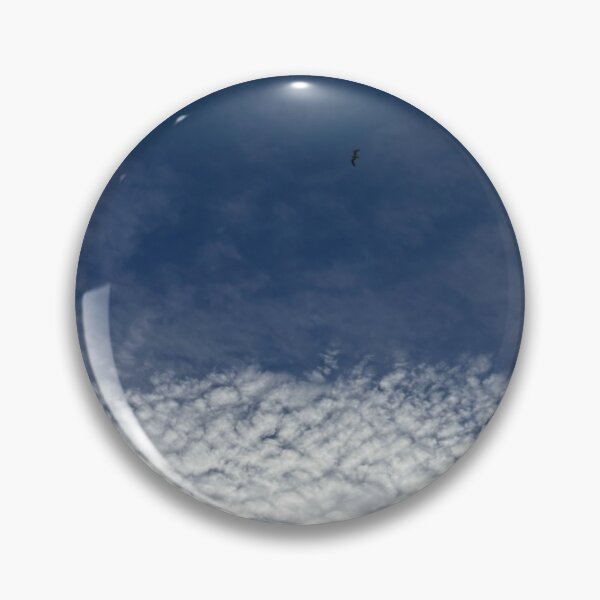 Item preview, a bird soars between blue skies and cool clouds in Glasgow (Scotland) in May 2026 designed and sold by photosbykel.