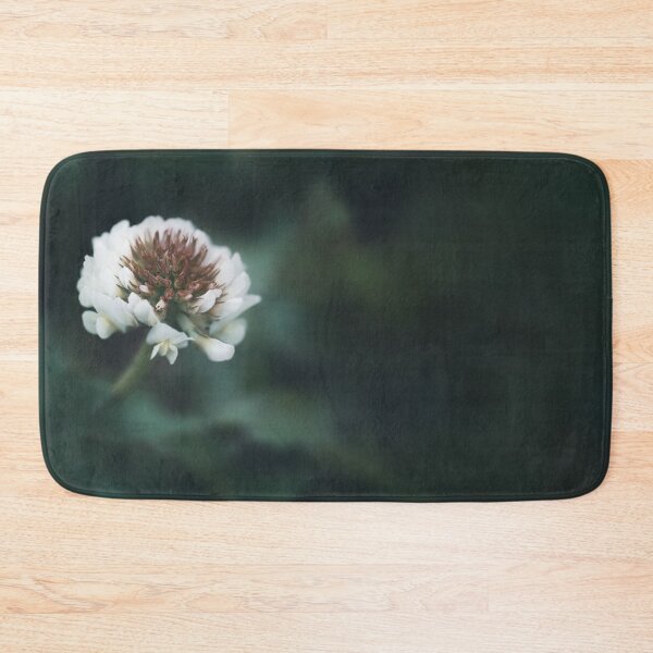 Item preview, White blooming clover flower on dark green background designed and sold by TanalyFlowers.