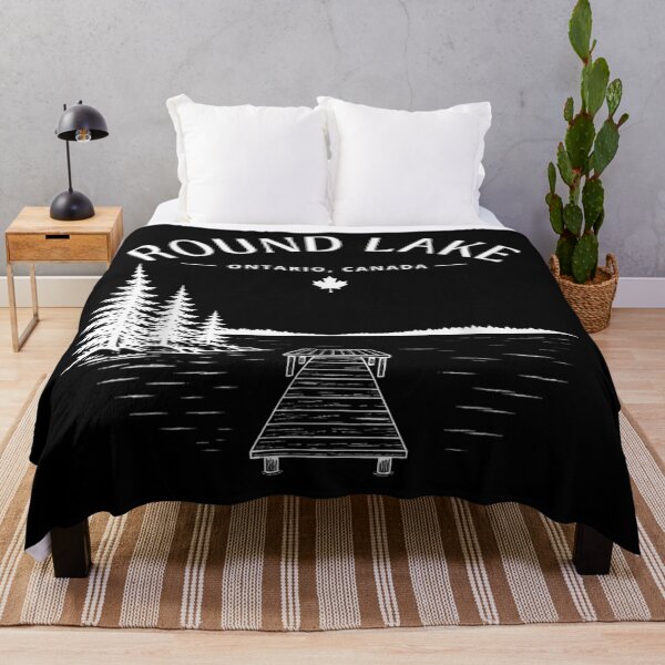 Item preview, Round Lake Ontario Canada Minimalist Pine Trees Nature Dock Wilderness Souvenir designed and sold by NgumohaLanke.