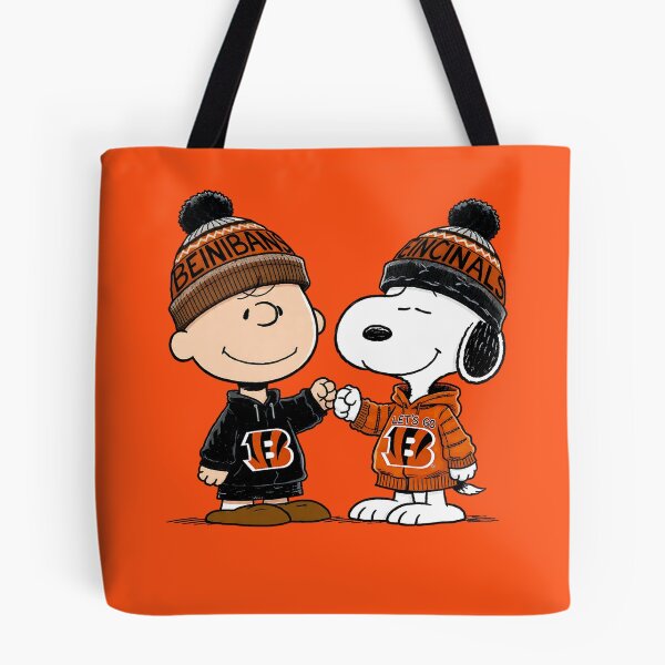 Item preview, Charlie Brown And Snoopy Cincinnati Bengals Football designed and sold by Peggy D Schafer.