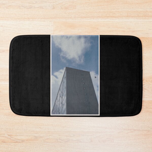 Item preview, bird swoops past a building on a day with a blue sky in glasgow (scotland) (may 2026) designed and sold by photosbykel.