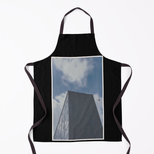 Item preview, bird swoops past a building on a day with a blue sky in glasgow (scotland) (may 2026) designed and sold by photosbykel.