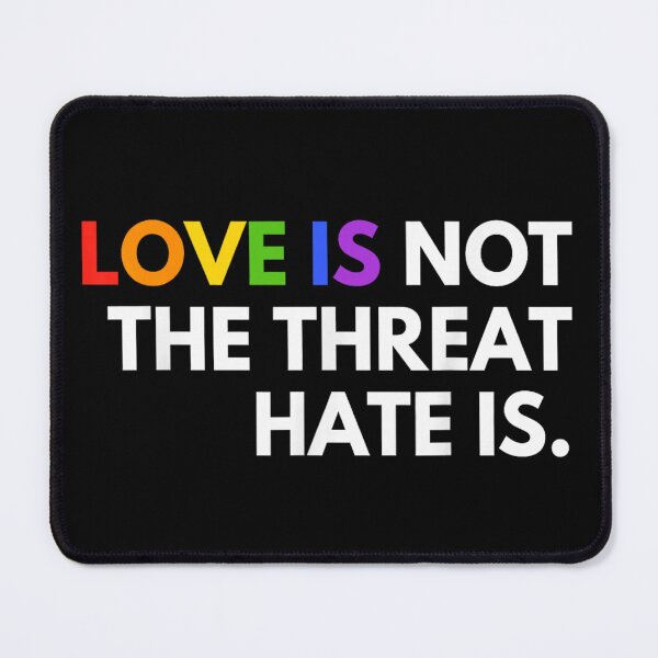 Item preview, Love Is Not The Threat Hate Is Rainbow Typography LGBTQ Art designed and sold by YubitaLeLe.