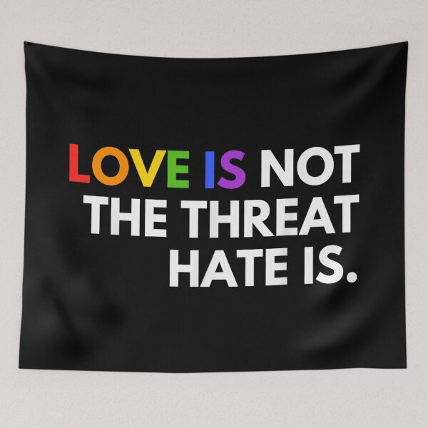 Item preview, Love Is Not The Threat Hate Is Rainbow Typography LGBTQ Art designed and sold by YubitaLeLe.