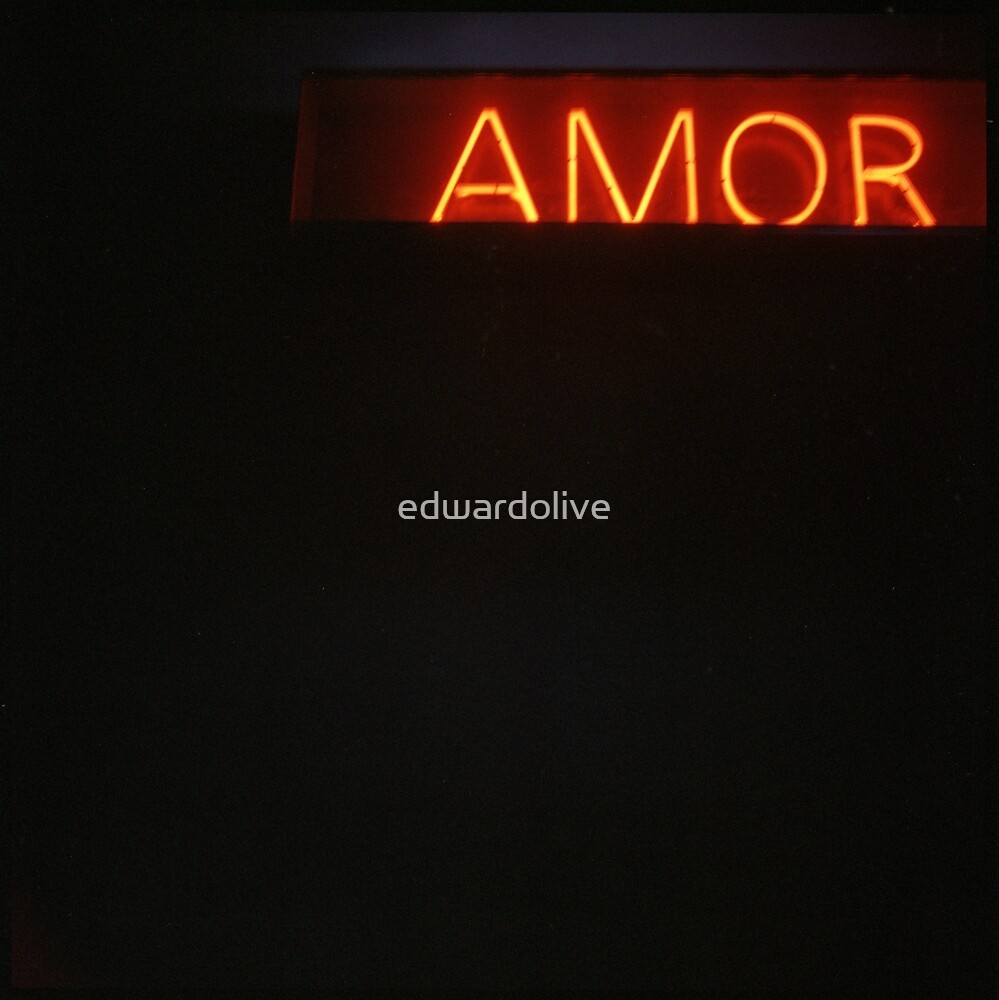 "Neon light sign Amor love in Spanish on black medium