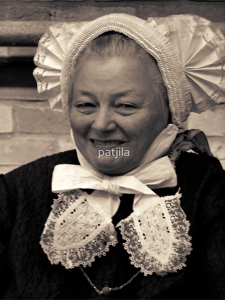 "A lovely lady wearing a traditional Dutch Salland's pleated ruffled