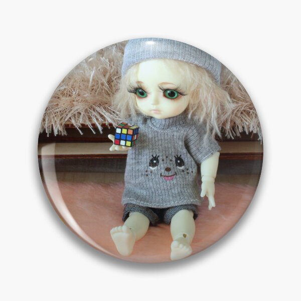 Item preview, Miniature nursery scene with bjd girl doll sitting on the floor and keeping toys in the hand. Some more toys are around her.  designed and sold by Lenasminiland.