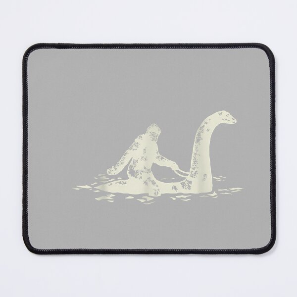 Item preview, Bigfoot Sasquatch Riding The Loch Ness Monster Funny,Short Sleeve designed and sold by GreggRoss.