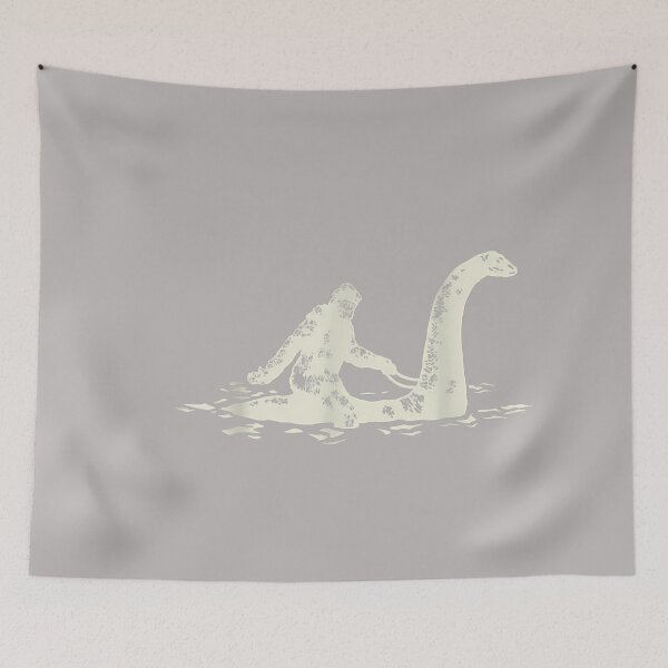 Item preview, Bigfoot Sasquatch Riding The Loch Ness Monster Funny,Short Sleeve designed and sold by GreggRoss.