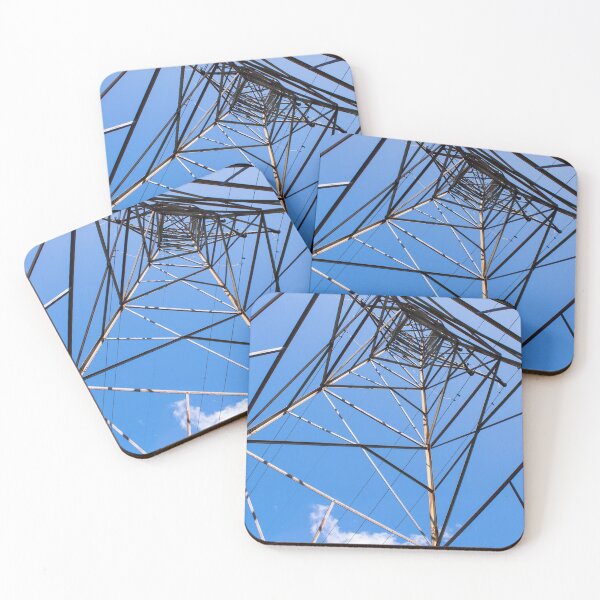 Item preview, A Tall Metal Electric Grid Tower Rises Against A Clear Blue Sky, Emphasizing Its Height And Structure designed and sold by Shonti.