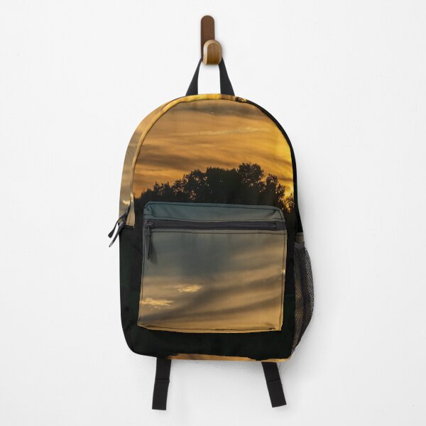 Item preview, Golden Sunset Behind Silhouetted Trees designed and sold by KillNFuel.