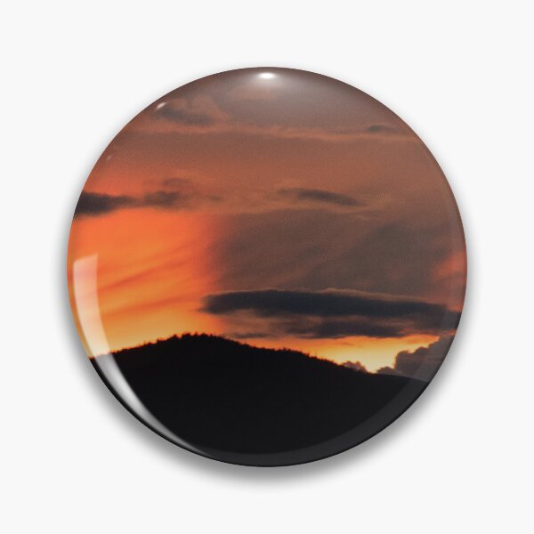 Item preview, Fiery Sunset Behind Mountain Peaks designed and sold by KillNFuel.