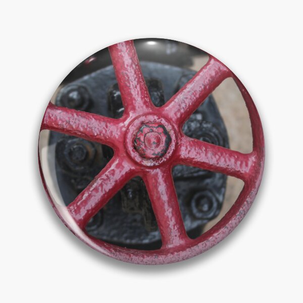 Item preview, Close-Up Of Red Valve Wheel On Industrial Pipe In Outdoor Plumbing Equipment designed and sold by Nmallia.