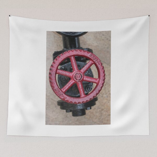 Item preview, Close-Up Of Red Valve Wheel On Industrial Pipe In Outdoor Plumbing Equipment designed and sold by Nmallia.