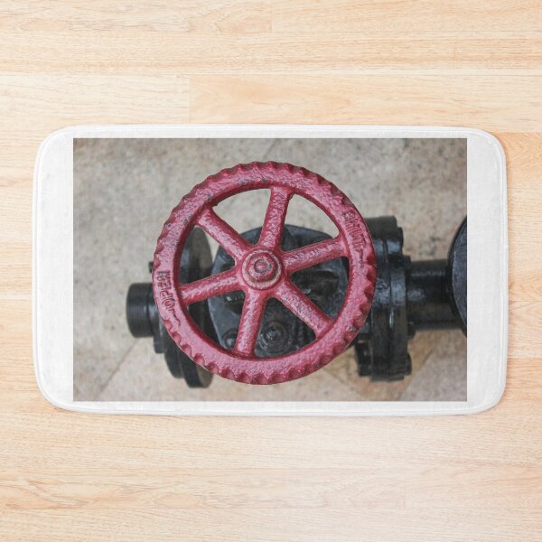 Item preview, Close-Up Of Red Valve Wheel On Industrial Pipe In Outdoor Plumbing Equipment designed and sold by Nmallia.
