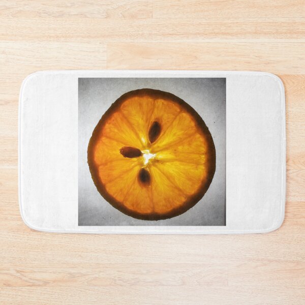 Item preview, Backlit Orange Slice Macro Close-Up Showing Translucent Citrus Flesh, Seeds and Textured Peel designed and sold by Nmallia.