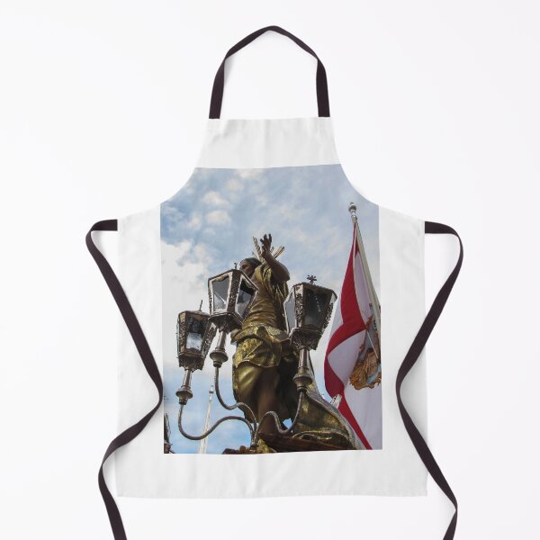 Item preview, Gilded Religious Statue With Lanterns and Flag During Outdoor Procession Under Cloudy Sky designed and sold by Nmallia.