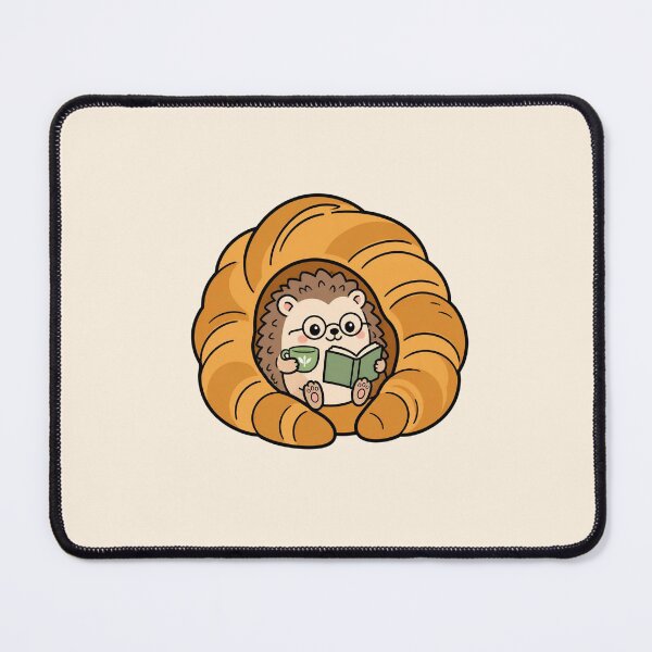 Item preview, Cozy Hedgehog Reading in a Croissant designed and sold by HoneyBun Creative.