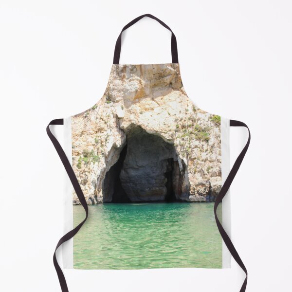 Item preview, Sea Cave Grotto With Turquoise Water and Rocky Cliff Entrance on Coastal Shoreline designed and sold by Nmallia.