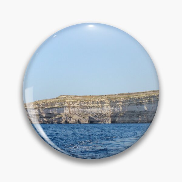 Item preview, Sea Cliffs and Blue Ocean Water Along a Rocky Coastal Landscape Under Clear Sky designed and sold by Nmallia.