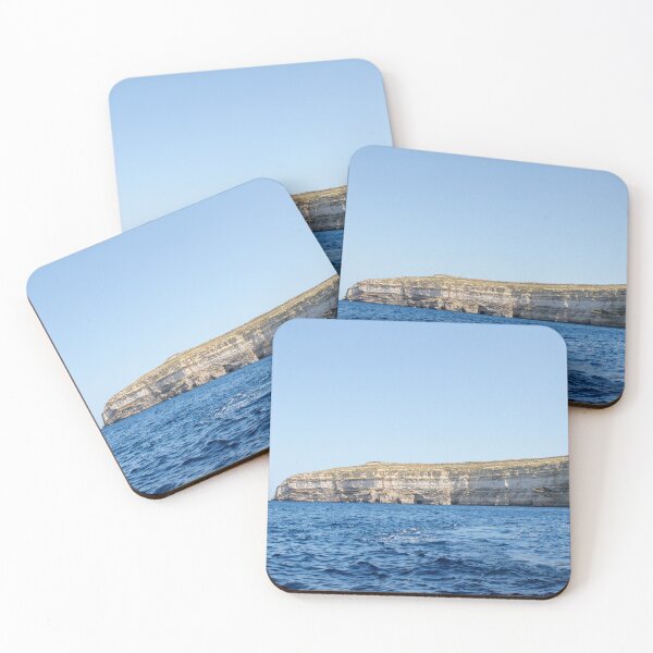Item preview, Sea Cliffs and Blue Ocean Water Along a Rocky Coastal Landscape Under Clear Sky designed and sold by Nmallia.