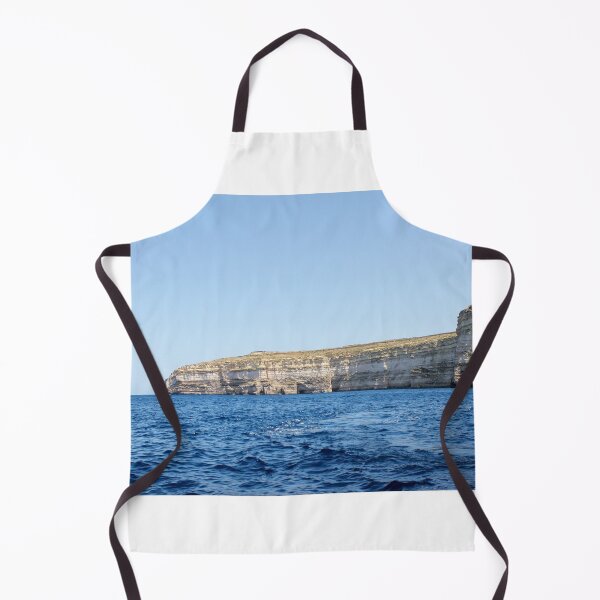 Item preview, Sea Cliffs and Blue Ocean Water Along a Rocky Coastal Landscape Under Clear Sky designed and sold by Nmallia.