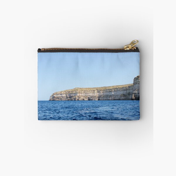 Item preview, Sea Cliffs and Blue Ocean Water Along a Rocky Coastal Landscape Under Clear Sky designed and sold by Nmallia.
