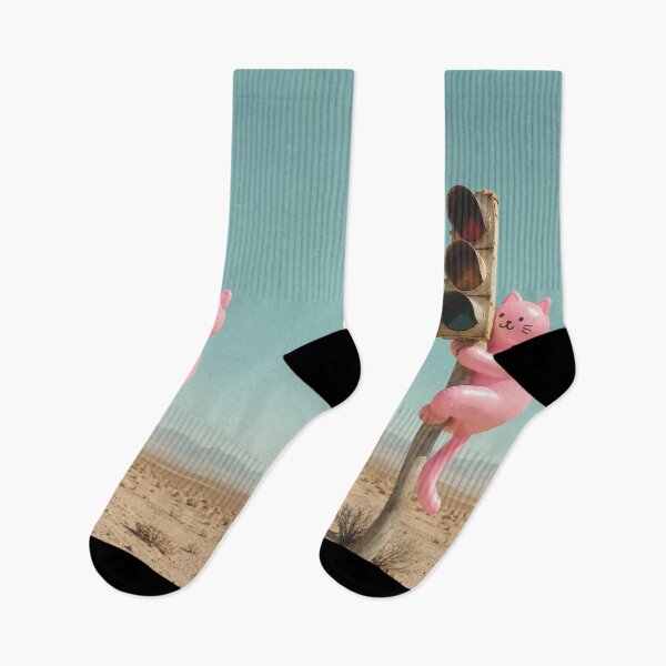 Item preview, Pink cat climbs onto traffic light in desert designed and sold by Mauswohn.