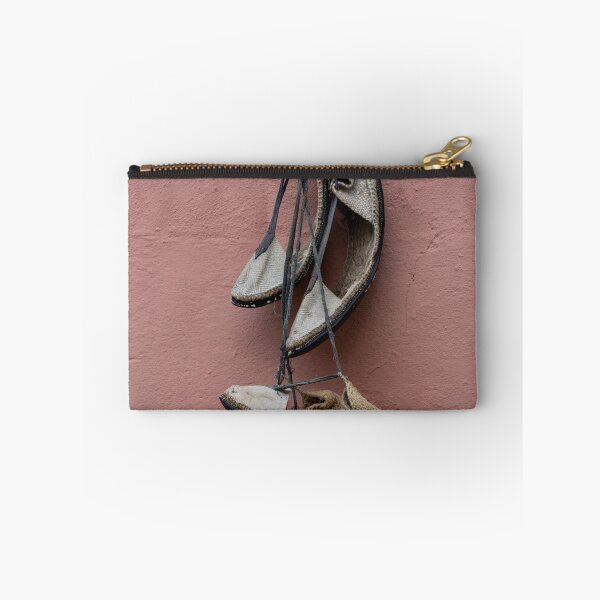 Item preview, A pile of shoes hanging on a wall. designed and sold by elopezstock.