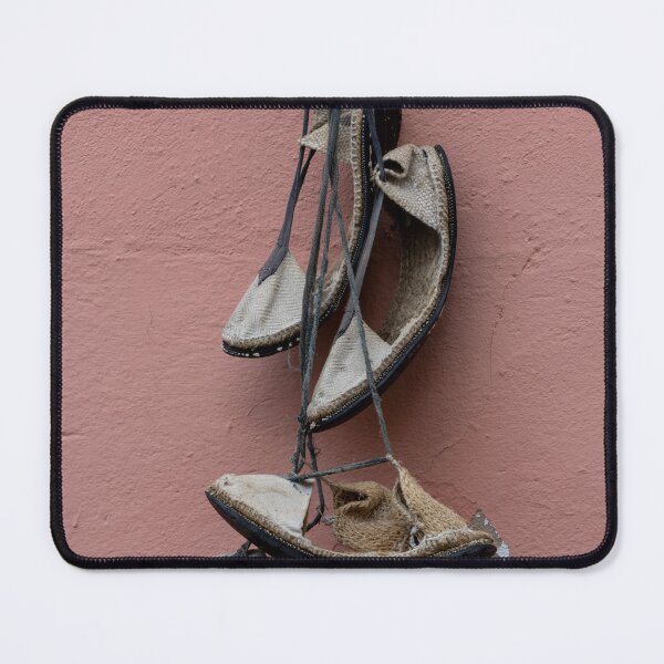Item preview, A pile of shoes hanging on a wall. designed and sold by elopezstock.