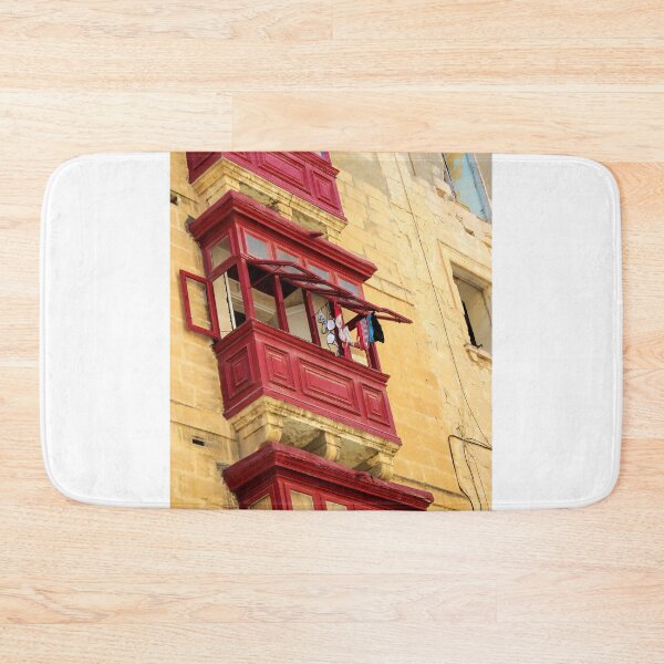 Item preview, Red Wooden Balcony With Hanging Laundry On Weathered Yellow Mediterranean Stone Facade designed and sold by Nmallia.