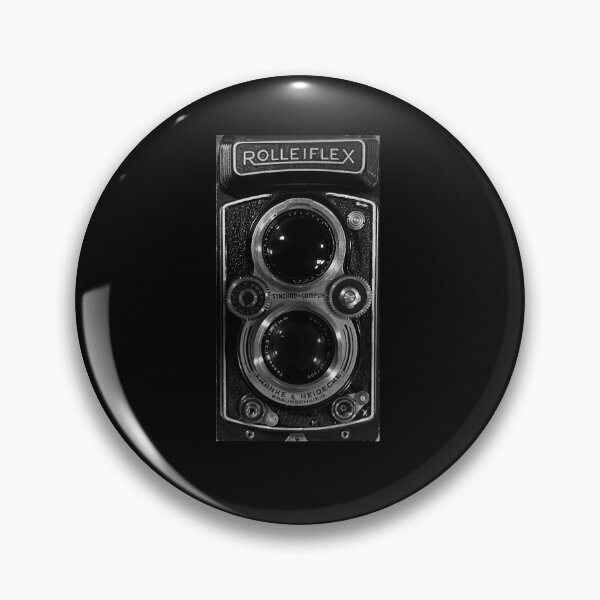 Item preview, Vintage Rolleiflex Camera Close-Up – Black and White Analog Photography Print designed and sold by matchudaarts.