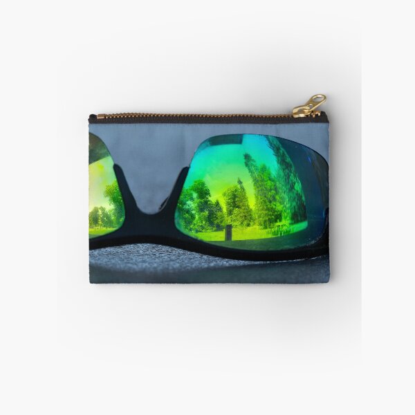 Item preview, Park trees and picnic shelter reflected in abandoned sunglasses designed and sold by lisavonbiela.