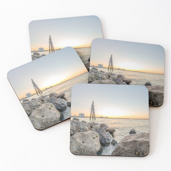 Item preview, Wooden Pylon and Rocky Coast at Portsmouth Sunset designed and sold by AndrewPHayward.