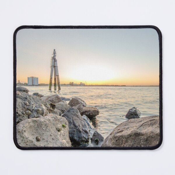 Item preview, Wooden Pylon and Rocky Coast at Portsmouth Sunset designed and sold by AndrewPHayward.